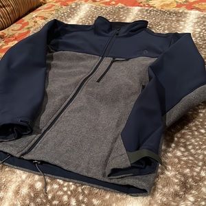 The North Face navy and gray mid weight full zip jacket, size Large